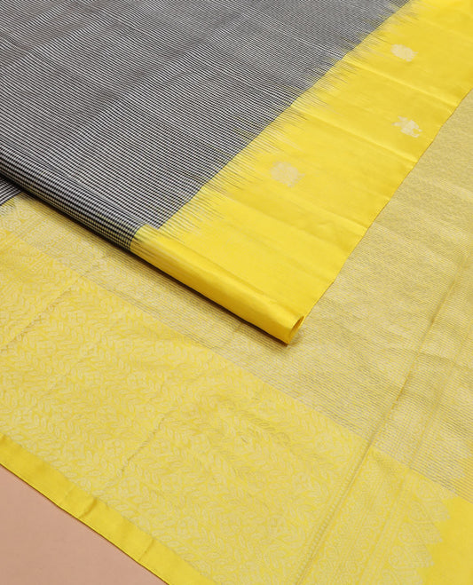 Multi-color micro-checked Kanchipuram silk saree, contrast border of animal motifs, and pallu of floral creeper designs