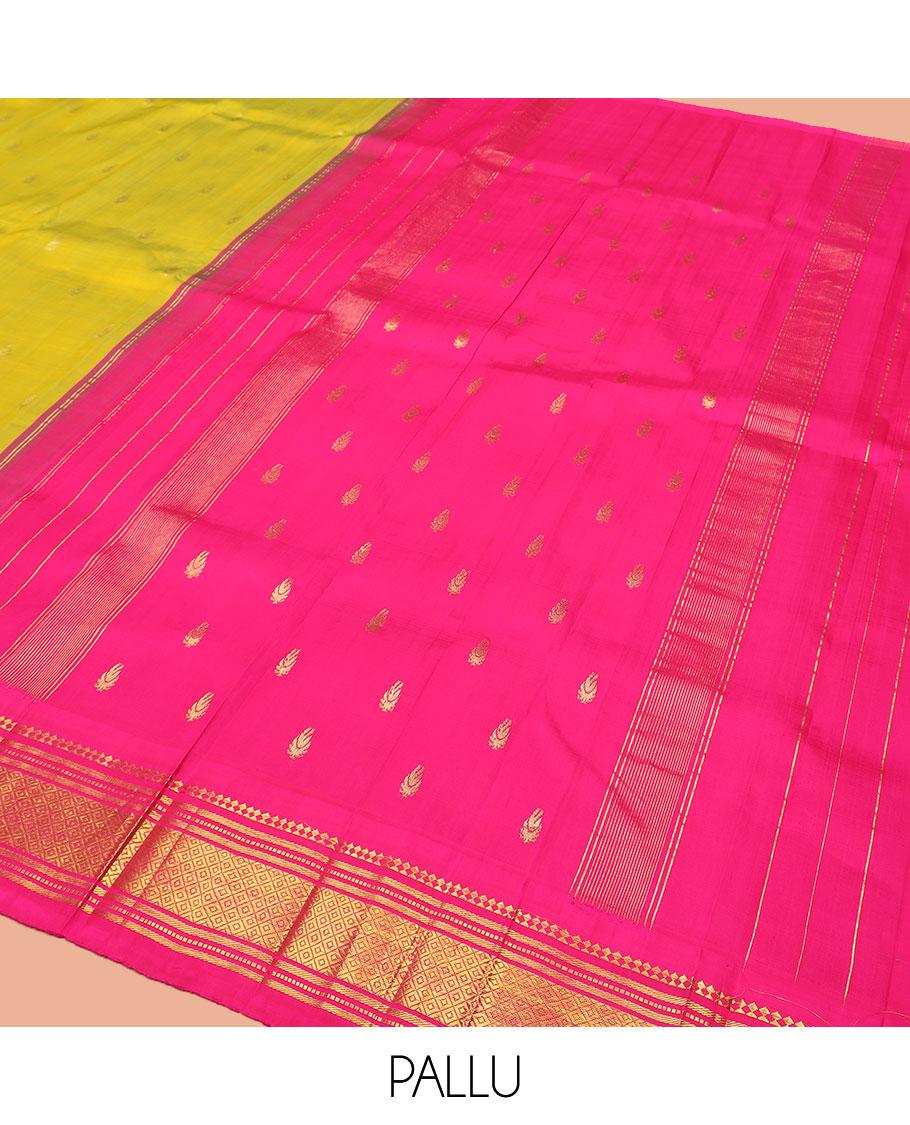 Green Kanchipuram Silk Saree Sparsely Sparkled with Zari Buttas All Over Its Body, Complemented by Contrast One-Sided Korvai Border of Paneer Sombu, Banaras, Muthu, and Mayil Kann Designs, Pallu of Zari Designs, and Comes Without a Blouse