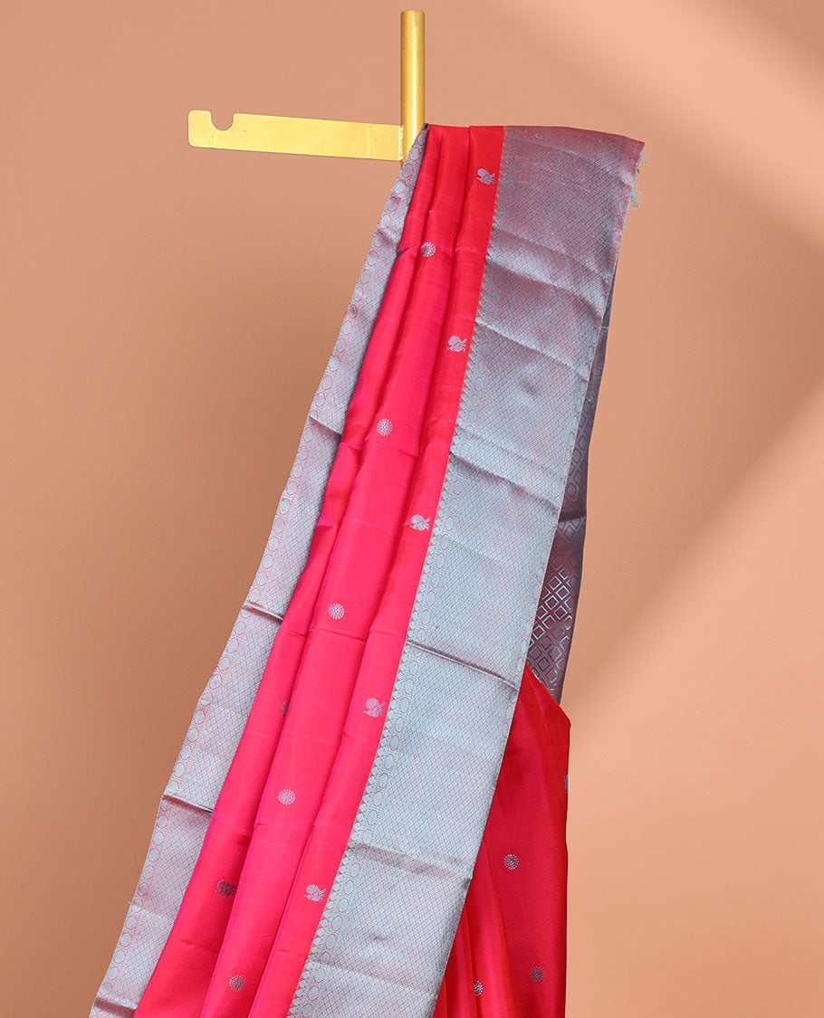 Pink buttas kancheepuram silk saree with contrast border of thilakam mokku, paun, kuyil kann design & zari design pallu