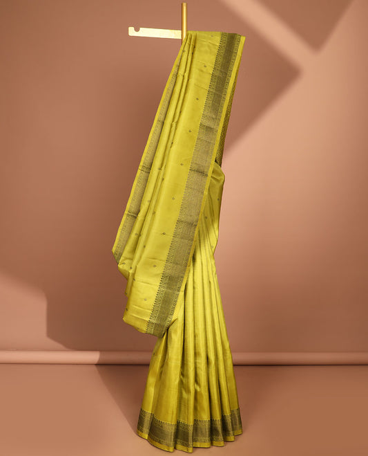 Green floral buttas kancheepuram silk saree with self border of thilakam mokku, muthu, banaras designs & zari design pallu