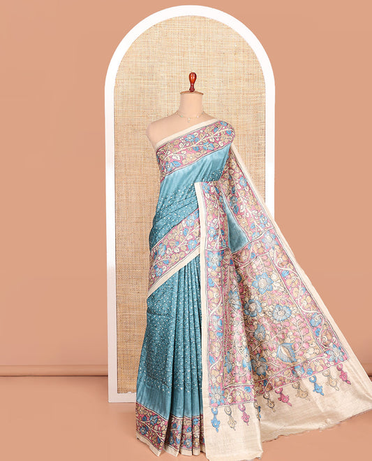 Blue Semi-Tussar Saree Meticulously Designed in Bandhani Dots, Complemented by a Contrast Kalamkari Floral Creeper Printed with Kantha Work Border, Pallu Featuring Floral Print Kantha Work, and Paired with a Contrast Printed Blouse