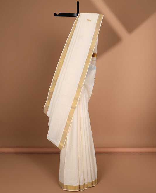 Cream zari buttas kerala saree, zari border & pallu of zari designs