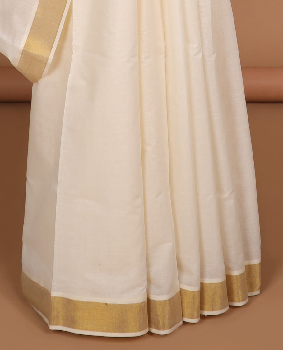 Cream zari buttas kerala saree, zari border & pallu of zari designs