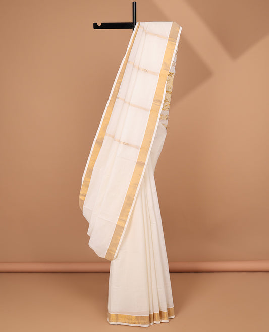 Cream kerala saree with zari stripes, zari border & pallu of floral designs