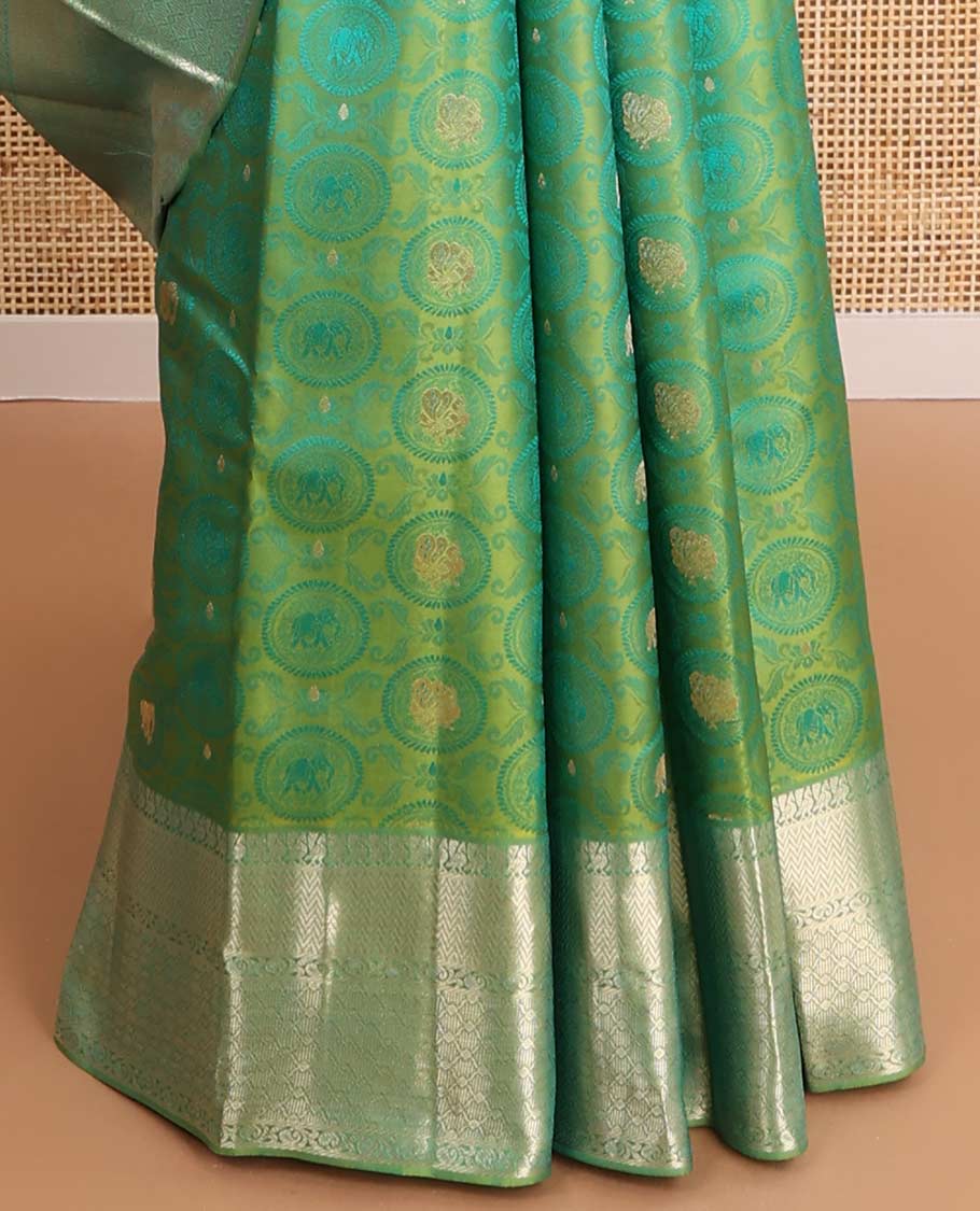 Green elephant, floral design kancheepuram silk saree with self intricate zari design border & geometric design pallu