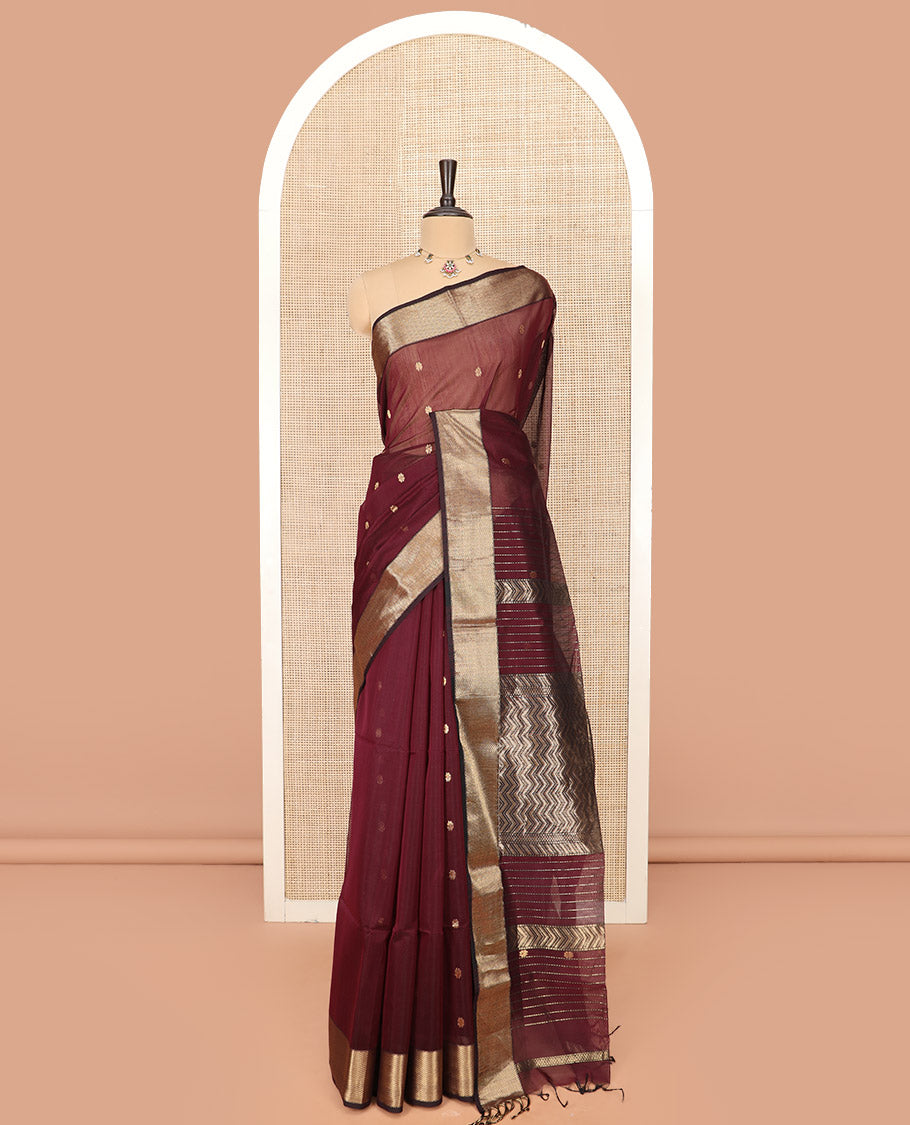 Maroon Maheshwari Cotton Saree Beautified with Floral Buttas, Highlighted with a Chevron Striped Zari Border, Pallu Steeped with Zari Stripes and Chevron Stripes, and Paired with a Matching Blouse