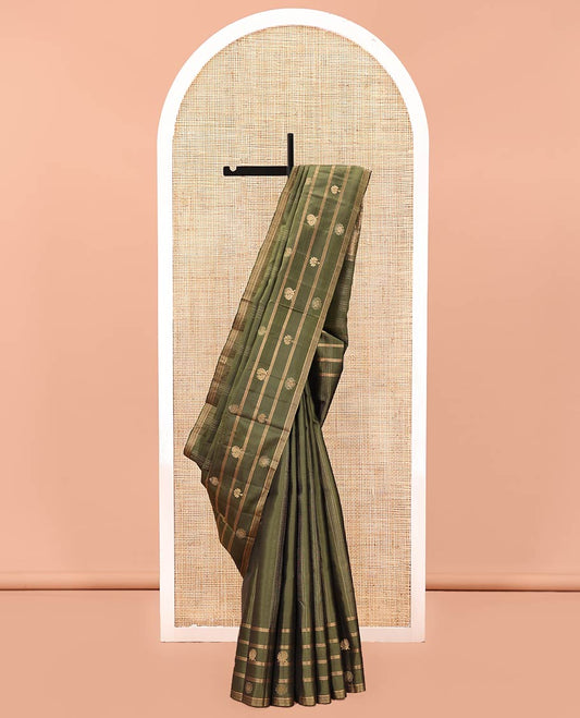 Green Mayuri Soft Silk Saree, Adorned with Buttas All Over Its Body, Highlighted by Self-Border of Buttas and Stripes, Intricately Designed Pallu and Paired with a Matching Blouse