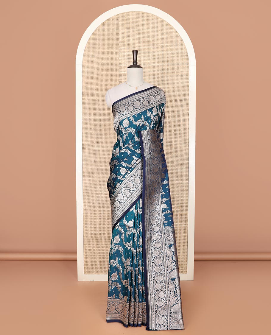 Peacock blue floral jaal jacquard mushru silk saree, floral design border, and pallu of intricate designs