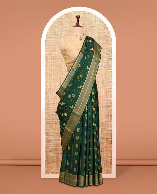 Green Mysore Silk Saree, Artfully Woven with Peacock-Deer Zari Buttas, Complemented by a Zari Geometric Border, a Grand Pallu, and a Matching Blouse