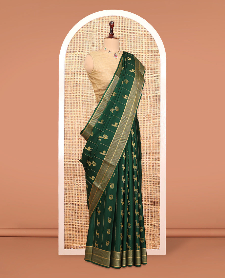 Green Mysore Silk Saree, Artfully Woven with Peacock-Deer Zari Buttas, Complemented by a Zari Geometric Border, a Grand Pallu, and a Matching Blouse