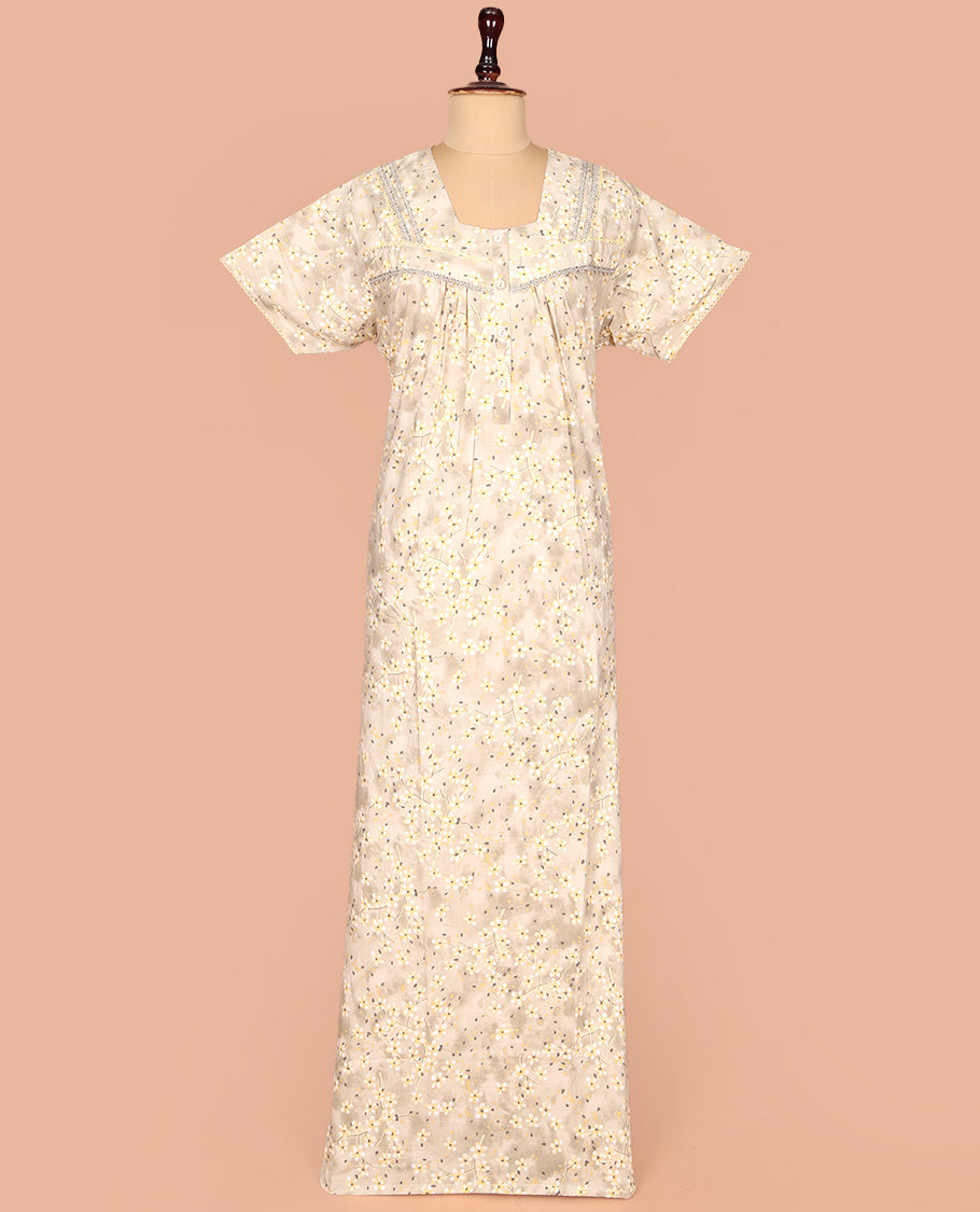 Beige Cotton Nighty Subtly Sparkled with Floral Print, Featuring Lace Work, Square Front Neck, and Half  Sleeves