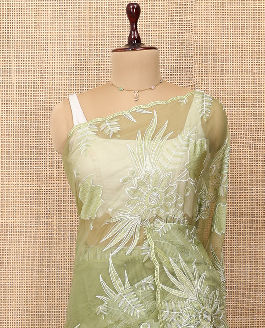 Green Organza Saree Beautified with Tropical Floral Embroidery, a Subtle Scallop Border, and a Matching Blouse