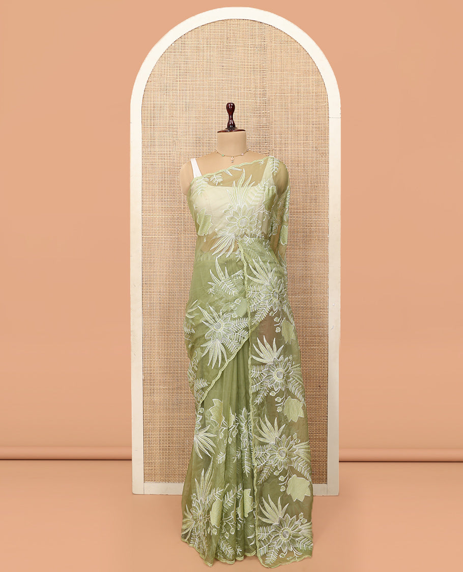 Green Organza Saree Beautified with Tropical Floral Embroidery, a Subtle Scallop Border, and a Matching Blouse