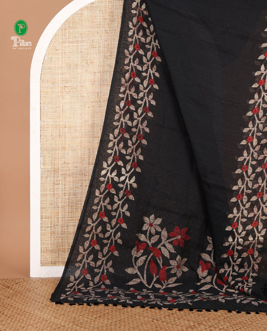Black jute saree with jamdhani style printed border & printed pallu along with butta design blouse