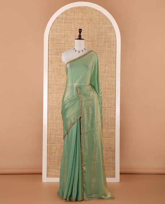 Pista green fendy chiffon saree with hand work border & self pallu along with hand work blouse
