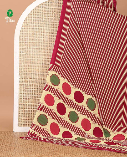 Magenta vertical stripes printed modal satin saree, a self-border of horizontal stripes print, polka dots printed on the pallu, and an intricate ajrakh-style printed blouse