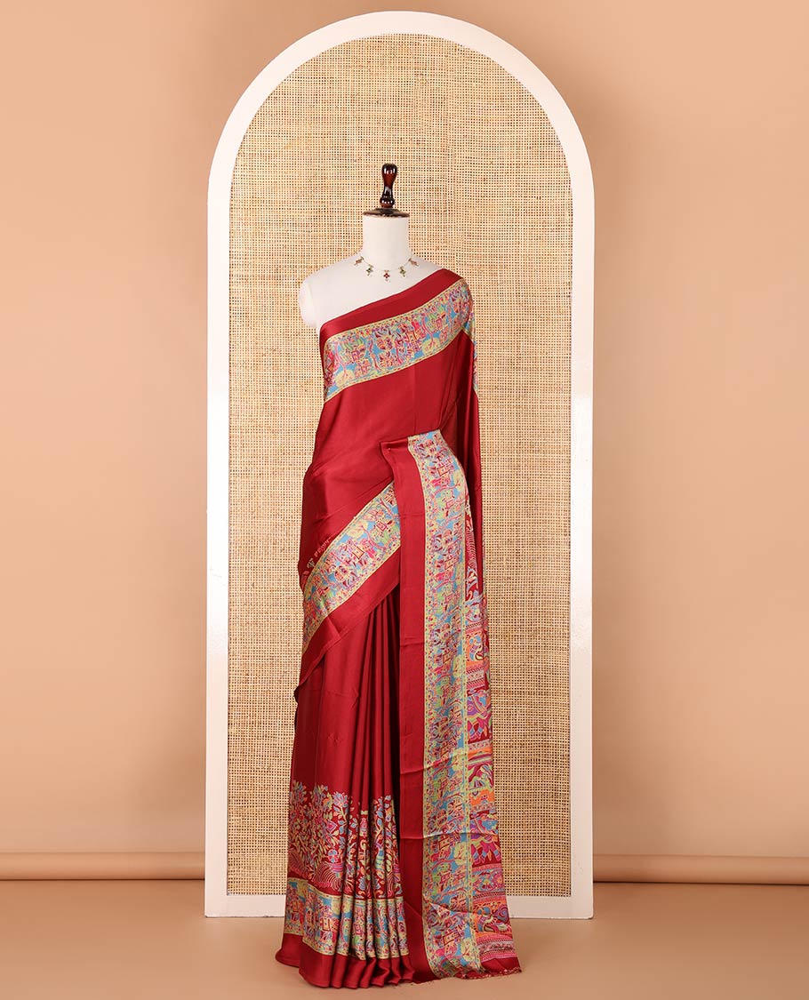 Maroon plain gajji silk saree, double-sided position printed border & pallu of animal & human motifs, with floral printed blouse