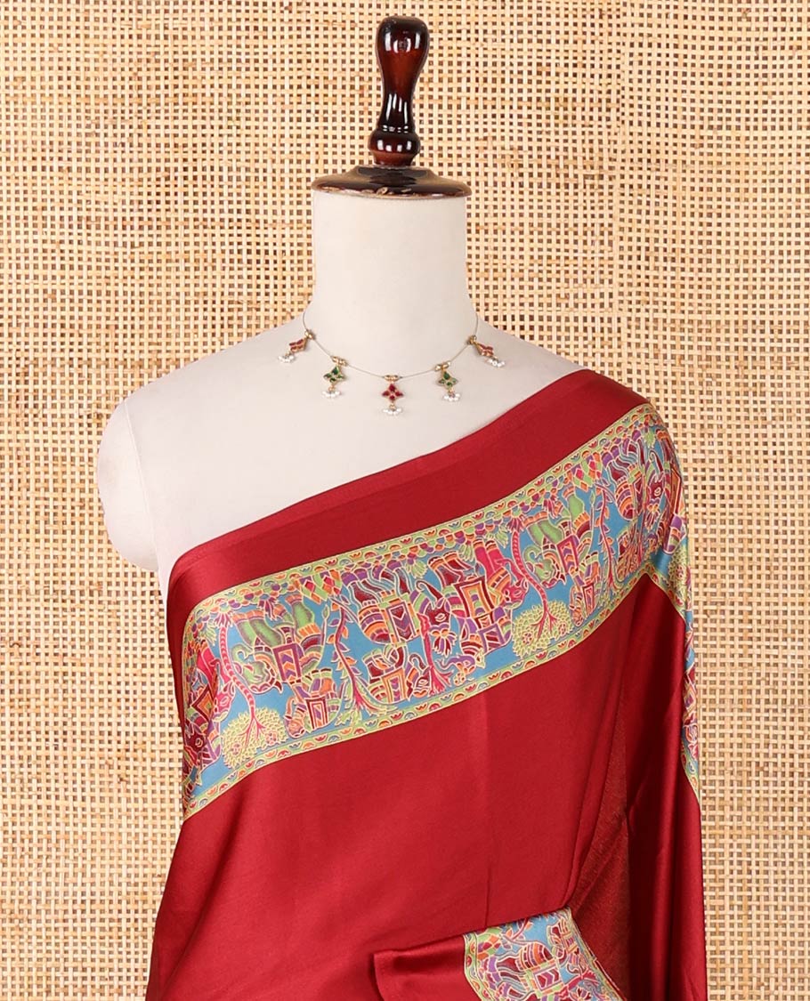 Maroon plain gajji silk saree, double-sided position printed border & pallu of animal & human motifs, with floral printed blouse