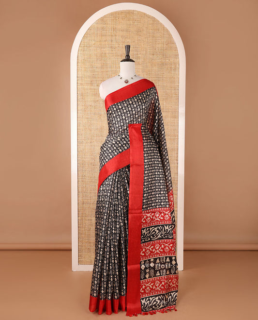 Black batik-style geometric motifs block printed khadi cotton saree,contrast border, batik floral print pallu & plain red blouse