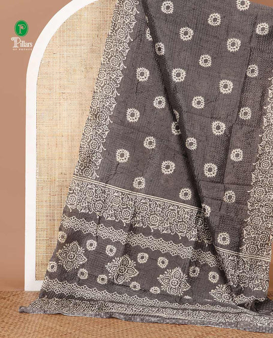 Grey batik-floral buttas printed litchi crushed saree, batik-floral printed border, printed pallu & butta print blouse