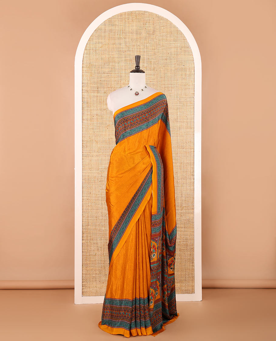 Mustard negative-style sparsely printed crepe silk saree, contrast printed border, printed pallu & printed blouse