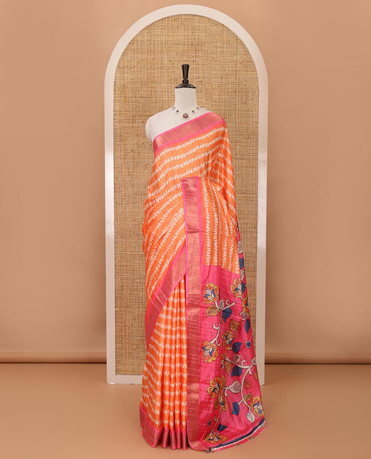 Orange uniquely printed soft tussar saree, contrast zari border, kalamkari floral vine printed pallu & kalamkari printed blouse