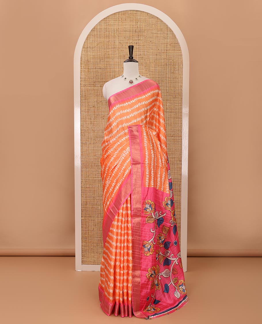Orange uniquely printed soft tussar saree, contrast zari border, kalamkari floral vine printed pallu & kalamkari printed blouse