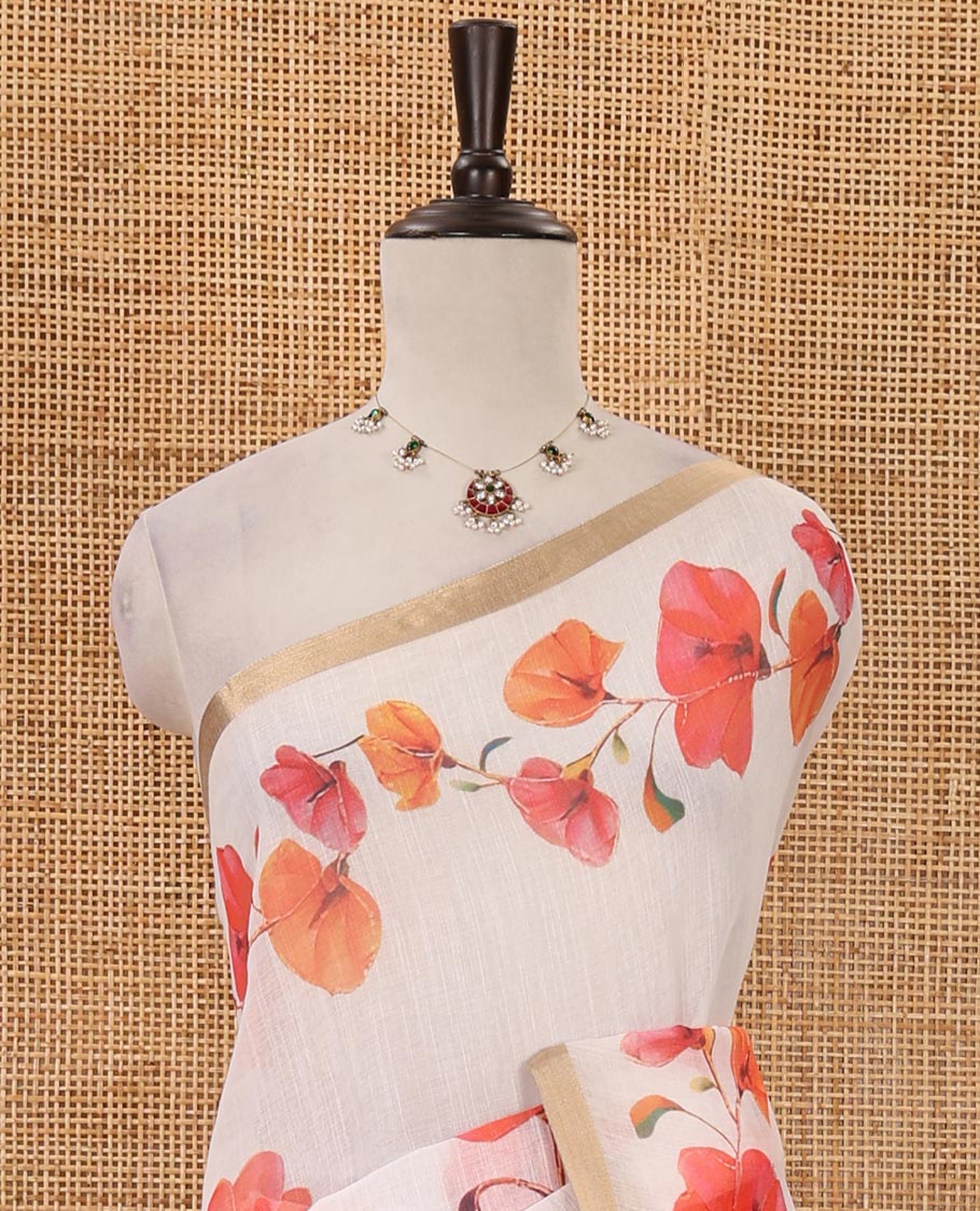 White-base orange color floral creeper printed linen saree, zari piping border, floral creeper print pallu & floral print blouse
