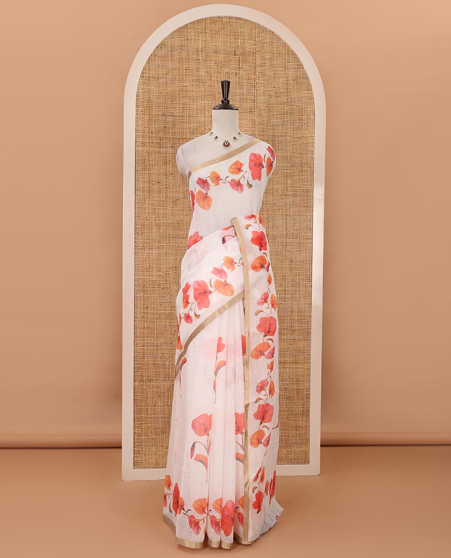 White-base orange color floral creeper printed linen saree, zari piping border, floral creeper print pallu & floral print blouse