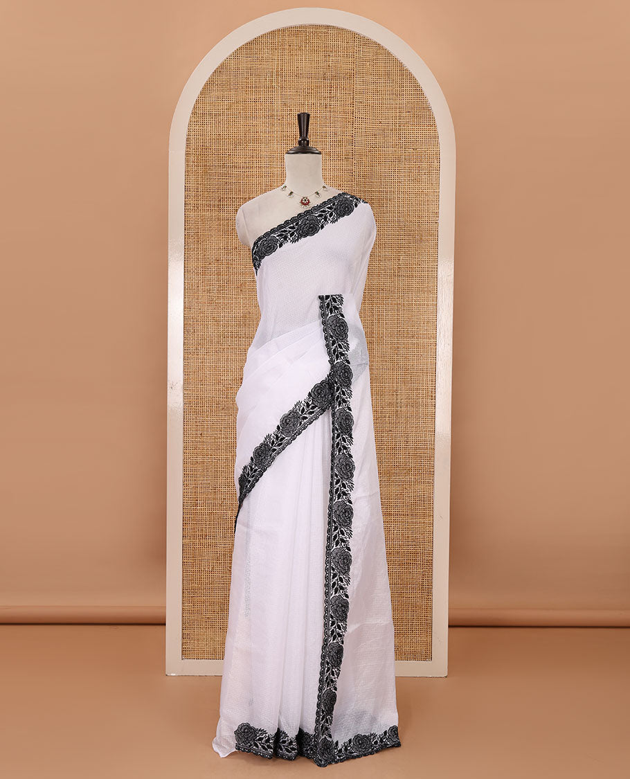 White plain kota checks saree, black rose thread embroidered scallop border & self-pallu & matching floral thread embroidered blouse