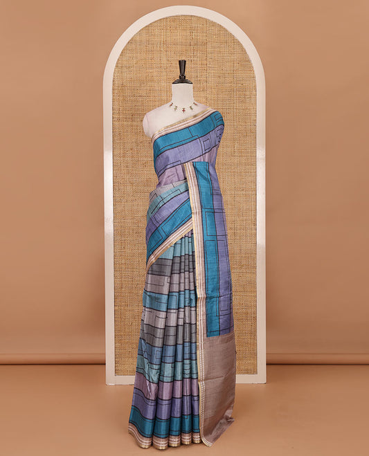 Blue abstract geometric printed semi-tussar saree, contrast thread triangle motifs border, striped pallu & contrast striped blouse