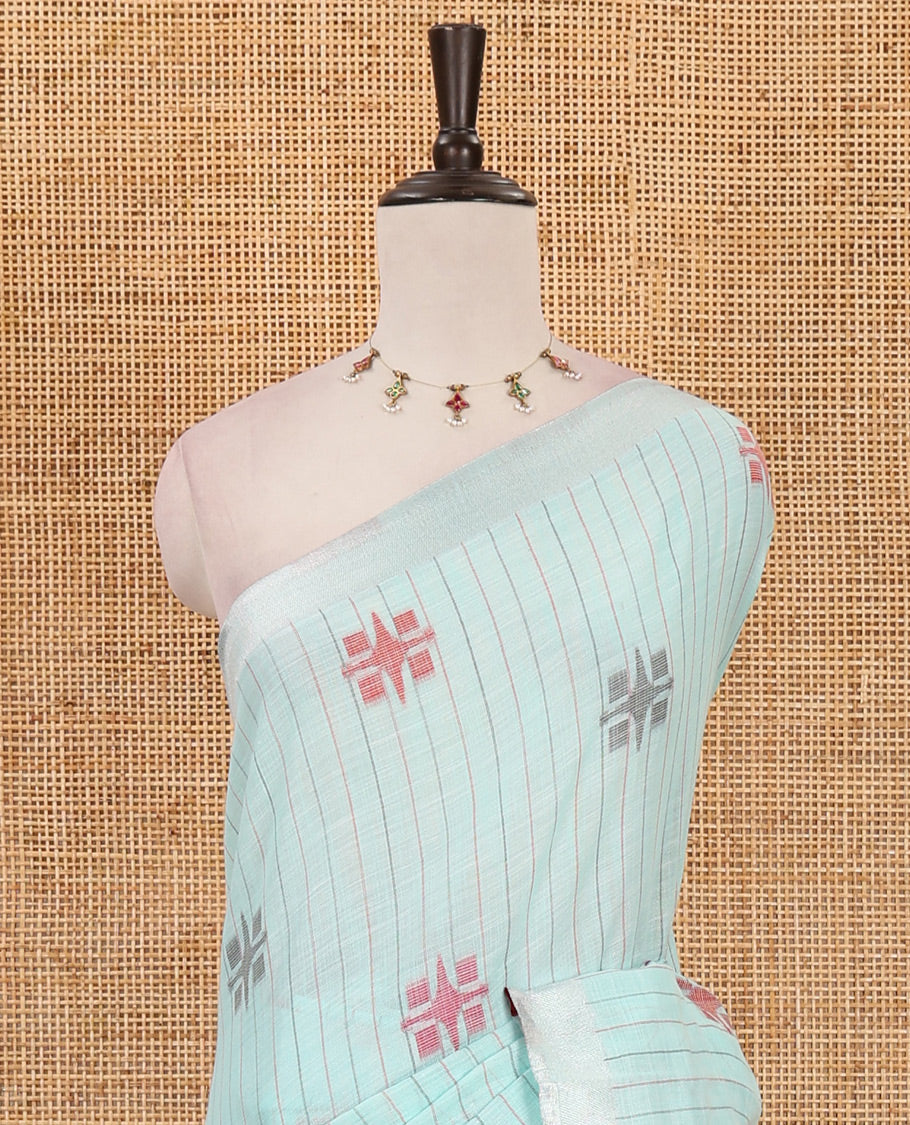 Sea blue vertical striped & geometric buttas Jute linen saree, Sliver zari border, geometric patterned pallu & vertical striped blouse