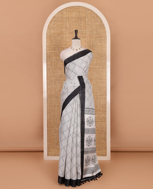 White-black diamond patterned khadi cotton saree, contrast plain border, intricate print pallu & contrast star motifs printed blouse
