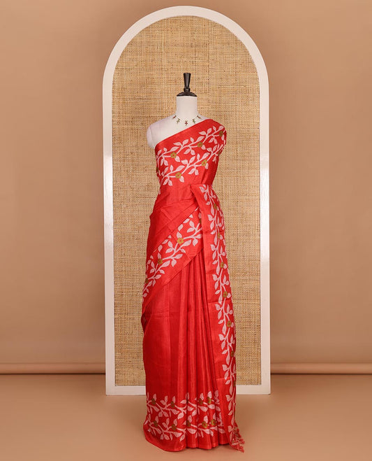 Red plain khadi cotton saree, floral creeper printed border, and pallu with small buttas printed blouse