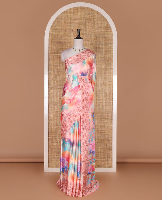 Pink colorful, floral printed turkey crepe saree, floral printed border, pallu, and contrast flower motifs printed blouse