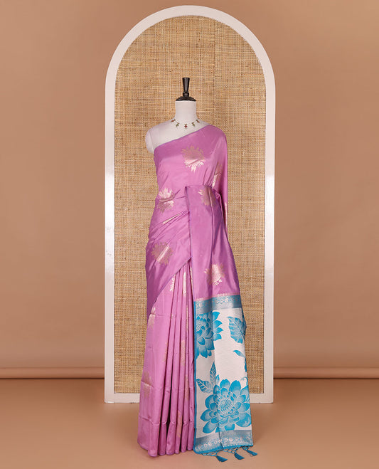 Borderless pink floral motifs steeped elite soft silk saree, contrast lotus-like motifs pallu, and contrast buttas blouse