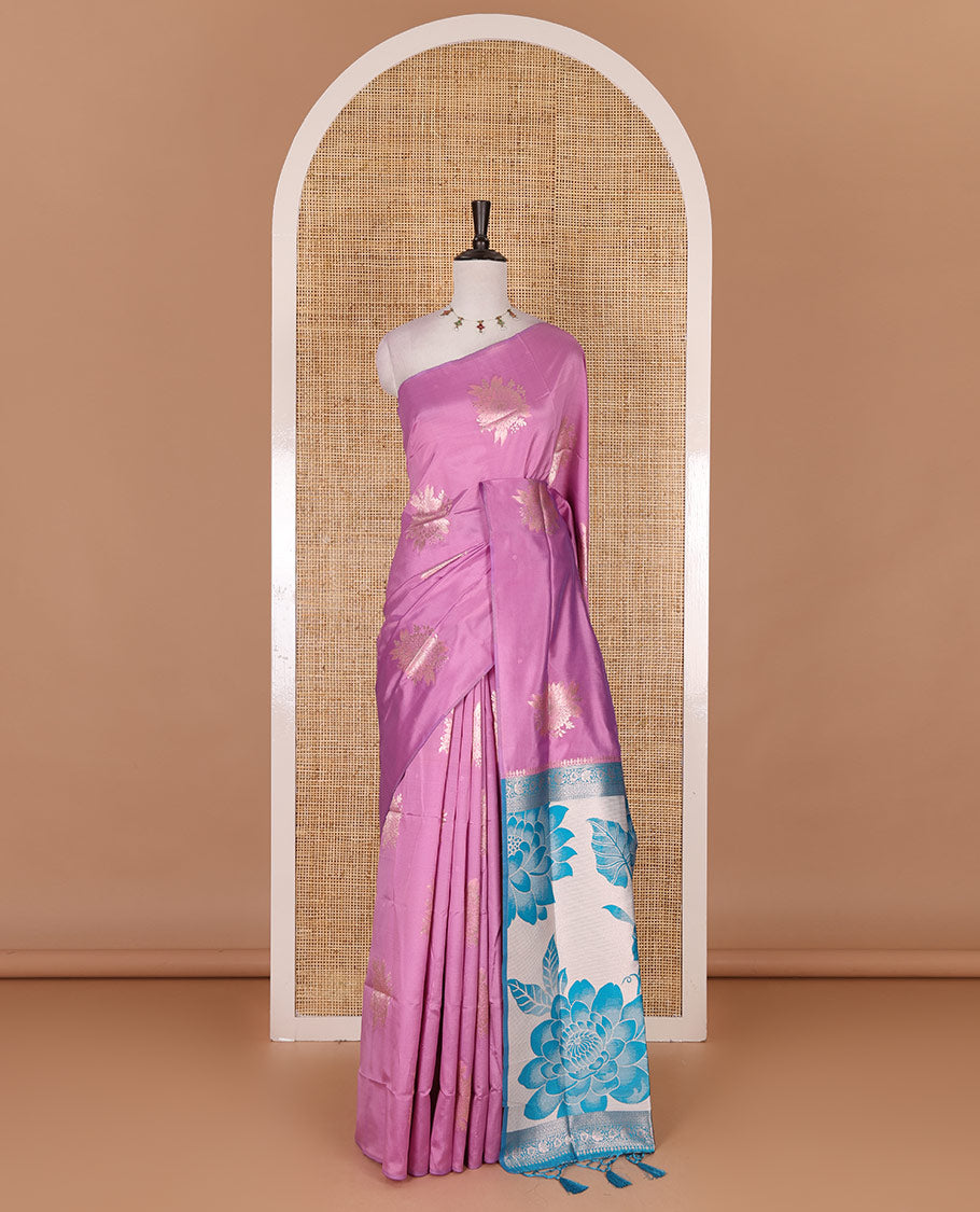 Borderless pink floral motifs steeped elite soft silk saree, contrast lotus-like motifs pallu, and contrast buttas blouse