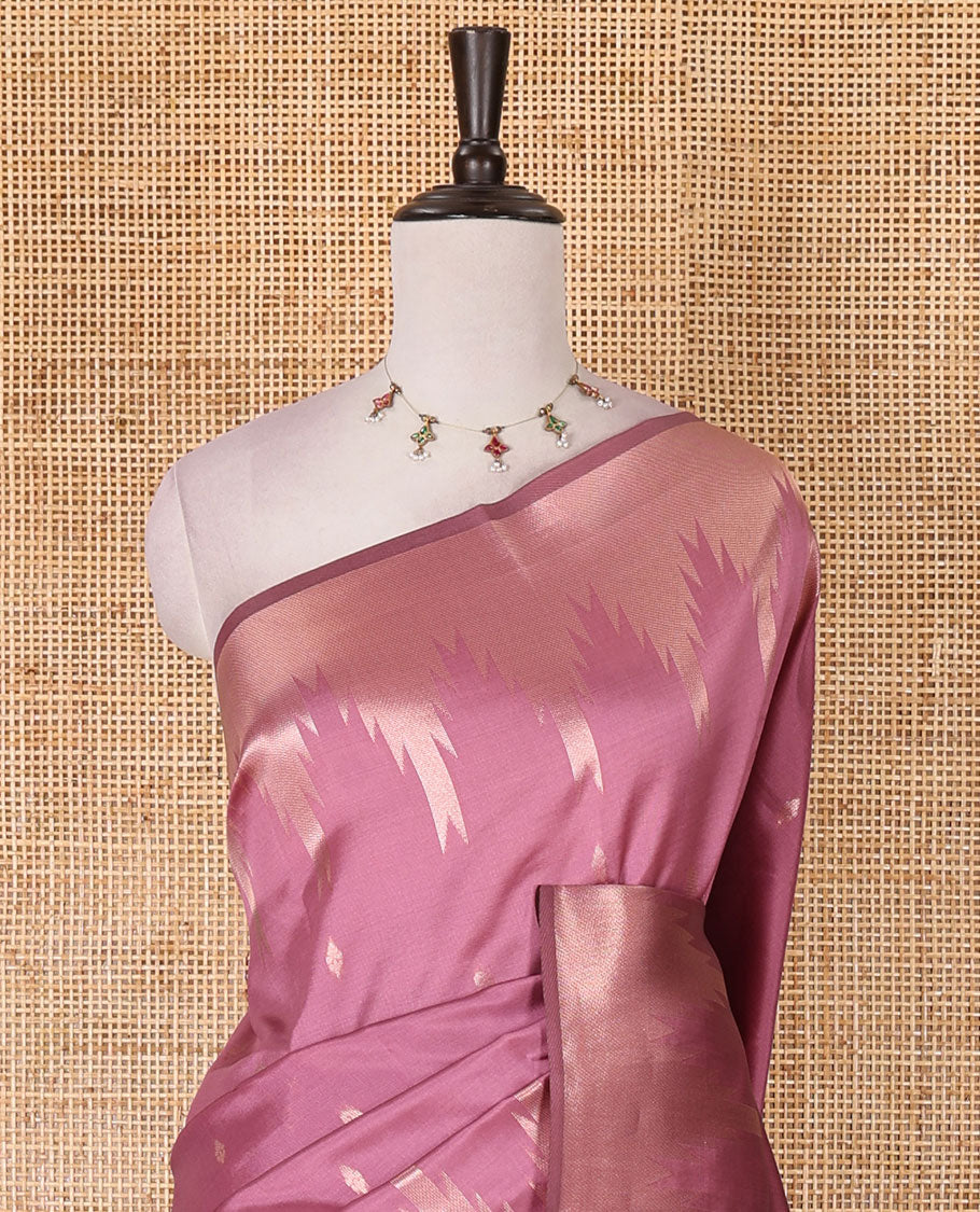 Pink zari buttas kanchi silk saree, temple zari border, zari-rich jaal pallu, and zari motifs woven blouse