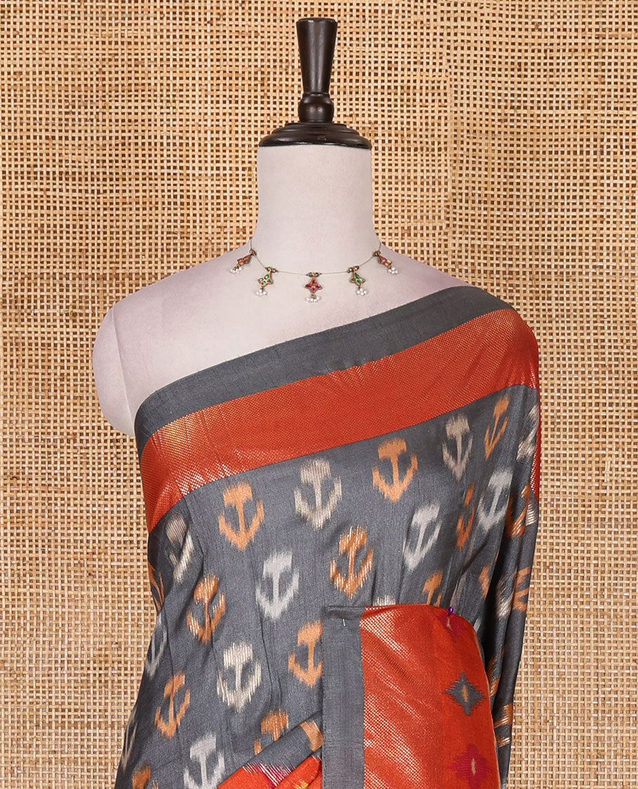 Grey pochampally style floral, and peacock printed dola silk saree, zari border, pallu of ikkat designs, and contrast ikkat motifs blouse