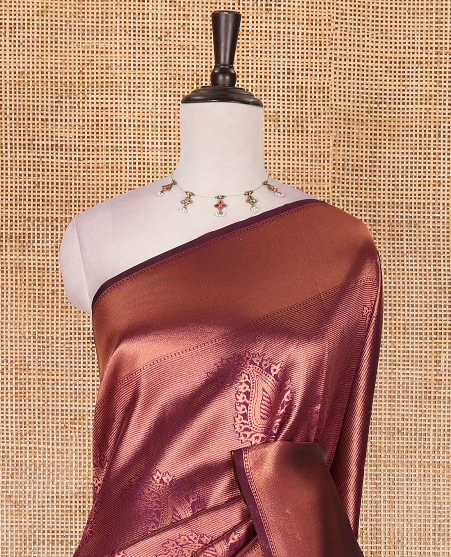 Wine paisley zari jacquard Kanchi tissue saree, zari border, pallu steeped with paisleys, and jacquard matching blouse