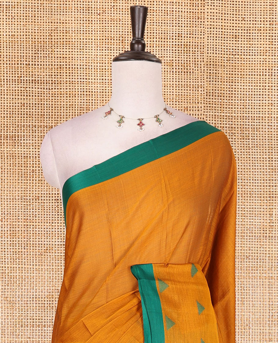Mustard triangle motifs mercerised cotton saree, contrast plain border, striped pallu, and matching triangle motifs blouse