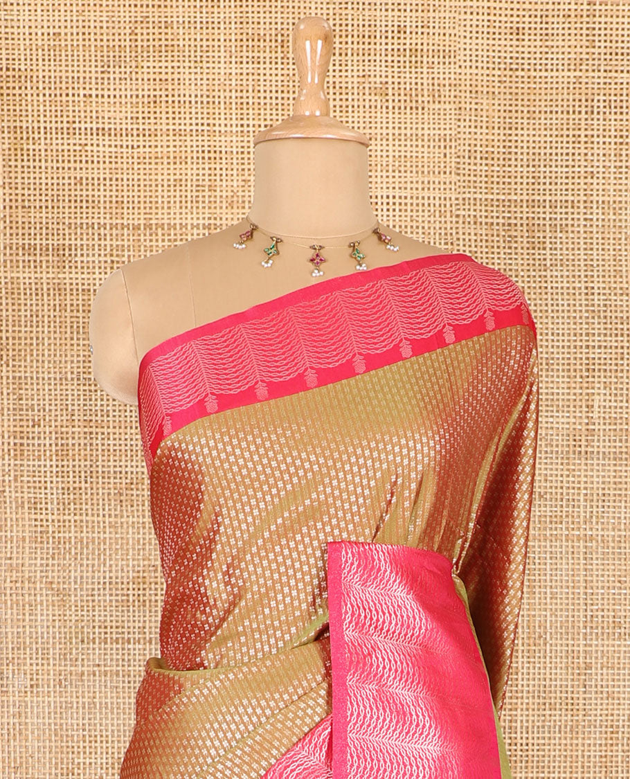 Mehendi green small zari buttas woven elite soft silk saree, contrast zari woven scallop satin border, jaal pallu, and a contrast chakram zari motifs blouse
