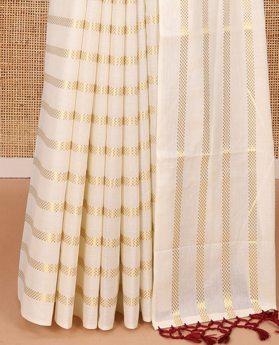 Borderless cream and maroon horizontal zari muthu striped Kerala cotton saree, self-pallu with tassels and a matching blouse