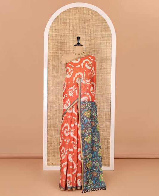 Borderless Orange shibori printed linen cotton saree, contrast kaleidoscope colored kalamkari floral vine print, and a contrast printed blouse
