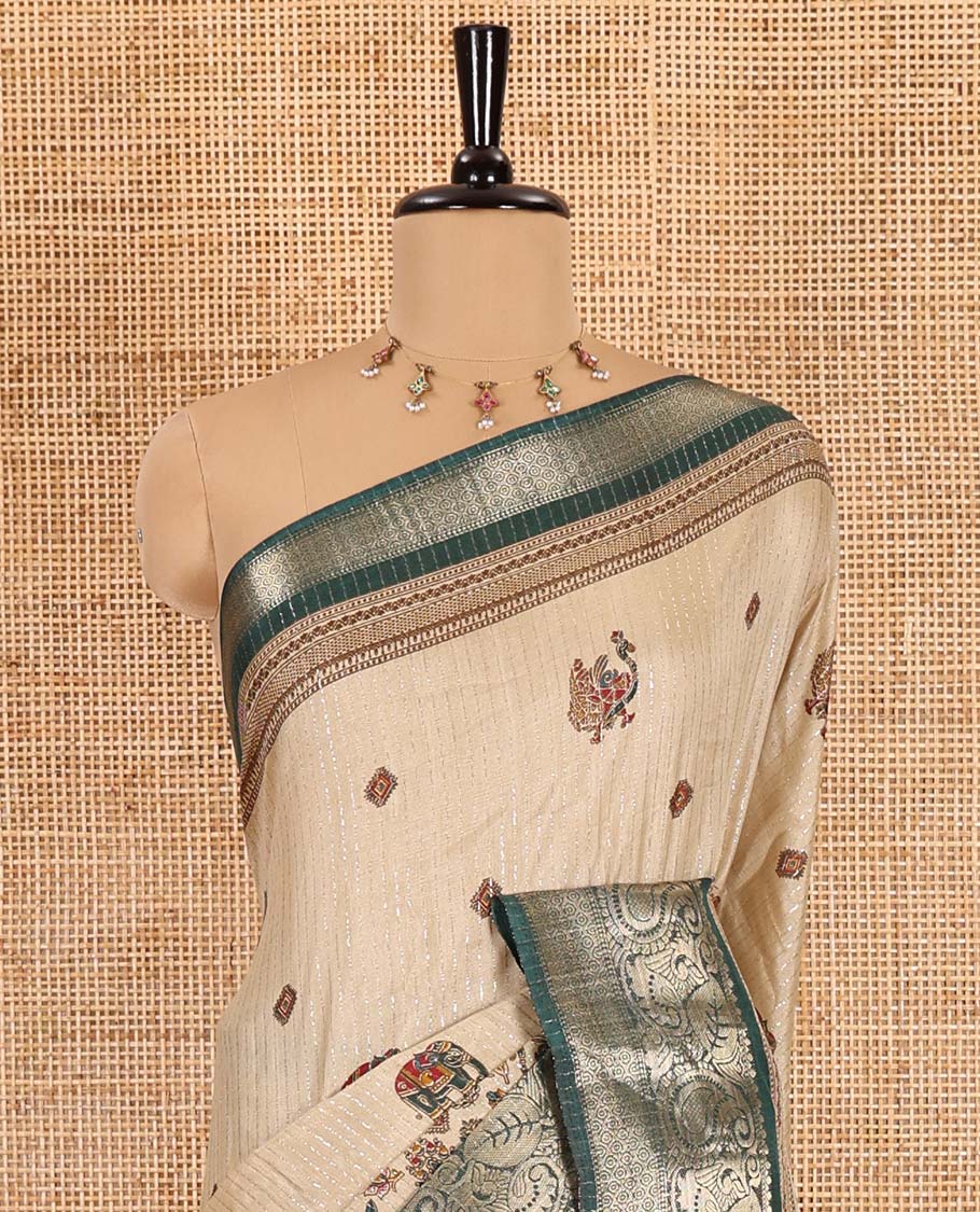 Chikku-green vertical striped, and animal motifs printed dola silk saree, contrast manga motifs zari border, animal motifs printed pallu, and a contrast printed blouse