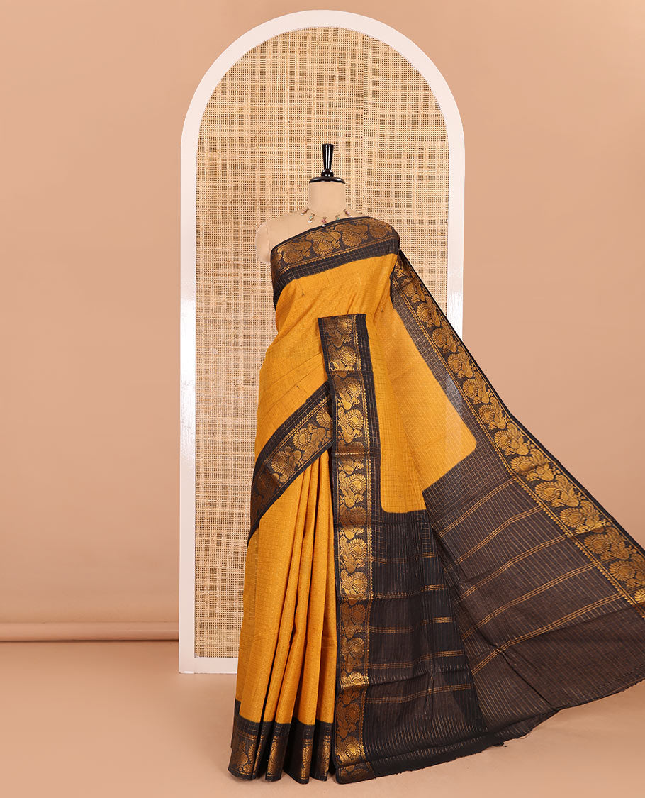 Mustard zari checked sungudi cotton saree, contrast zari border of peacock motifs, zari striped border, and a contrast blouse
