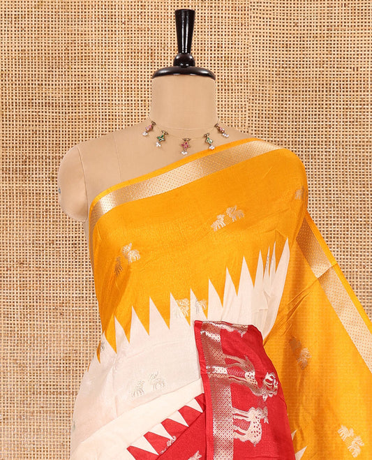 Cream deer zari motifs dola silk saree, contrast red-yellow ganga jamuna deer motifs zari woven border, paisley-diamond printed pallu, and a contrast deer motifs blouse