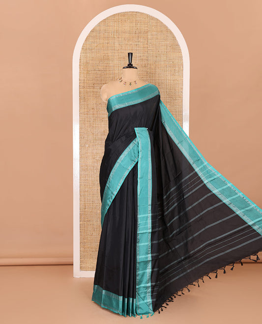 Black plain semi-soft silk saree, contrast horizontal zari striped border, striped pallu, and a matching blouse
