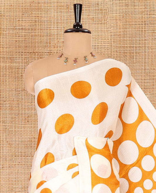 Borderless cream-mustard polka dots printed art khadi cotton saree, pallu of big and small coin-size polka dots print, and a small dots printed blouse