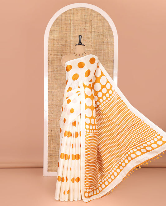 Borderless cream-mustard polka dots printed art khadi cotton saree, pallu of big and small coin-size polka dots print, and a small dots printed blouse